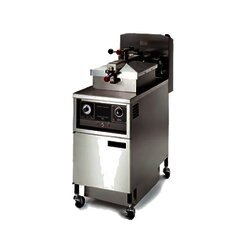 Freidora a presion a gas capacidad 43 libras.